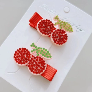 Sparkling cherry hair clips with red rhinestones and green leaves for girls