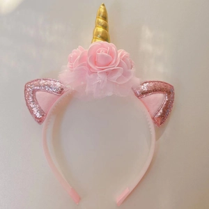 Pink and gold unicorn headband with fabric roses and sequins for girls party costumes