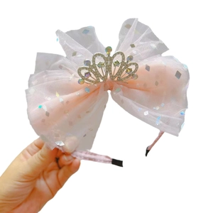 Cerchietto principessa rosa con grande fiocco in rete e corona di strass argentata