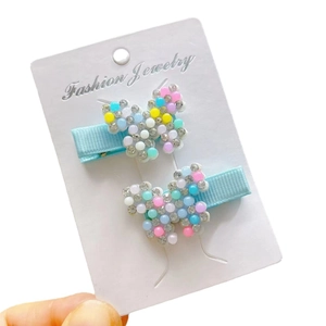 Cute butterfly hair clips set for girls with colorful beads and light blue ribbon wrapping