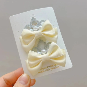 Barrettes à cheveux crème pour filles avec couronne argentée pailletée et perles blanches
