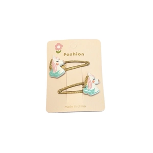 Lot de barrettes licorne pailletées pour filles avec motifs arc-en-ciel sur carte rose