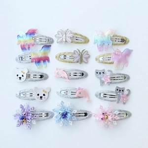 Detailed set of 15 colorful glitter hair clips featuring unicorn, butterfly and snowflake designs