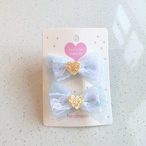 Sweet light blue lace bow hair clips with glittery heart center for girls
