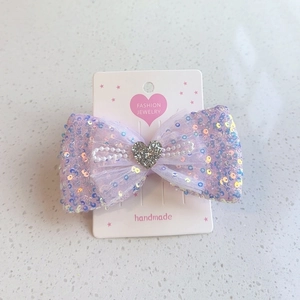 Barrette à cheveux nœud à paillettes violettes avec cœur pour filles sur marbre