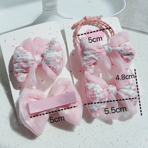 Détails de l'ensemble de barrettes à fleurs roses avec dimensions précises