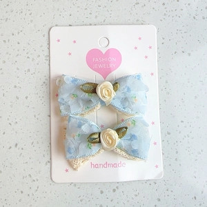 Floral lace hair clips with fabric bow and small roses for girls on white heart card