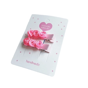 Lot de deux barrettes à cheveux roses en satin fait main pour filles sur carte bijou