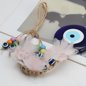 Handmade woven hemp rope Evil Eye wall hanging with colorful beads and mesh for home or car