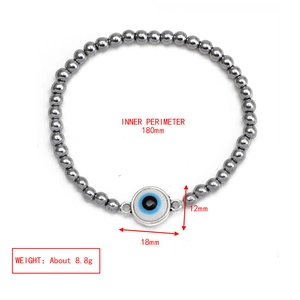 Detail view of Evil Eye beaded bracelet showing 18mm pendant and 180mm inner length
