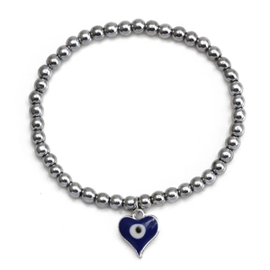 Close-up of hematite beaded bracelet featuring a blue heart-shaped Evil Eye pendant