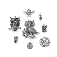 Set of 8 antique silver owl charms in various poses for DIY jewelry making and necklaces