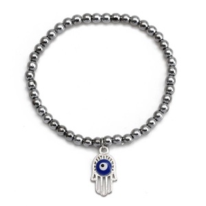 Detailed macro view of hematite beads and Hamsa Hand charm with Evil Eye on a bracelet