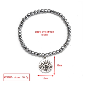 Detail showing Evil Eye pendant dimensions 19x16mm on metallic beaded bracelet with 180mm inner diameter