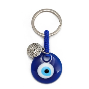 Golden horseshoe evil eye keychain with blue sapphire bead and sun engraved pendant