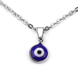 Close-up of a silver Evil Eye necklace with a blue enamel pendant on white background