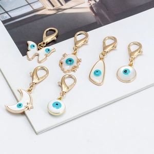 Porte-clés Turc Mauvais Oeil Main de Fatima Papillon Alliage Plaqué Or Émail Goutte d'Huile Anneau pour Femme Homme Sac Pendentif