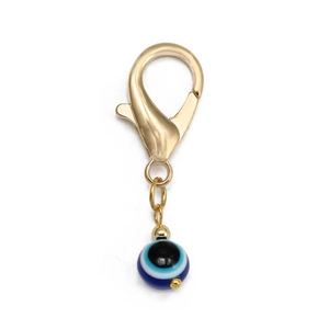 Porte-clés doré avec perle de l'œil turc bleu et fermoir mousqueton poli pour accessoires