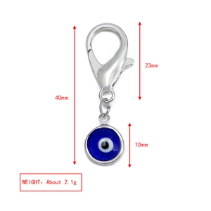 Detailed view of silver evil eye keychain with dimensions 40mm length and 2.1g weight