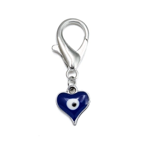 Detailed view of silver lobster clasp with blue heart-shaped enamel evil eye pendant