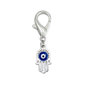 Macro detail of silver Hamsa Hand keychain with blue Evil Eye bead and lobster clasp