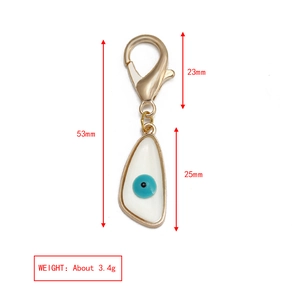 Vue détaillée du porte-clés Evil Eye avec dimensions de 53 mm et poids de 3,4 g