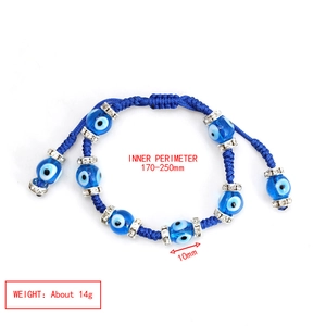 Detail of 10mm blue Evil Eye beads on adjustable braided rope bracelet with silver spacers