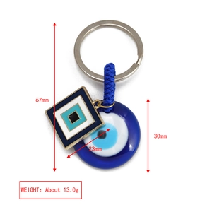 Blue Evil Eye keychain with detailed dimensions including 67mm length and 30mm pendant