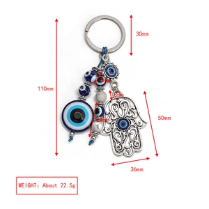 Detail of Hamsa Hand and Evil Eye keychain showing dimensions 110mm and 22.5g weight