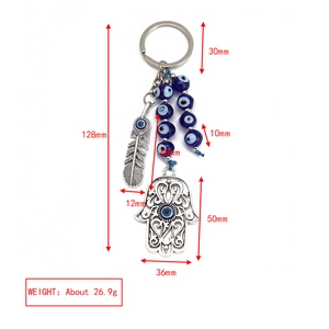 Hamsa Hand and Evil Eye keychain dimensions showing 128mm length and 26.9g weight