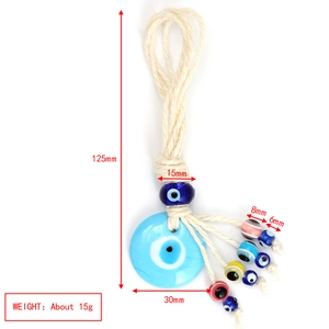 Detail view of handmade evil eye glass charm with measurements 125mm and hemp rope