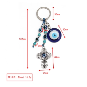 Detail view of Evil Eye keychain with cross charm and dimensions for Turkish blue eye pendant
