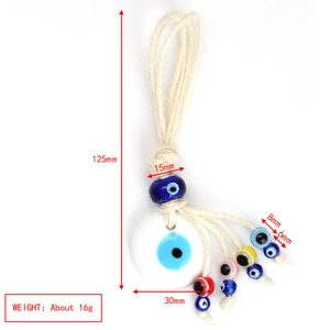 Detailed dimensions of Evil Eye woven rope ornament with blue glass beads and colorful tassels