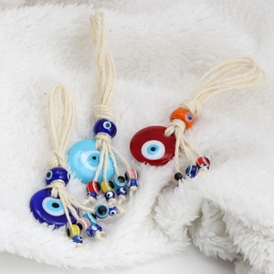 Turkish Evil Eye woven rope pendants in blue and red designs with colorful beads
