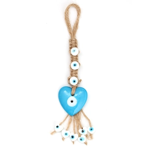 Detailed view of handmade Evil Eye heart pendant with macrame rope and blue glass charms