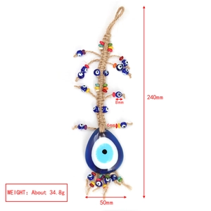 Detail view of Evil Eye charm with blue glass beads and measurements showing 240mm length