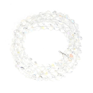 Detailed macro view of multifaceted iridescent glass beads for jewelry making