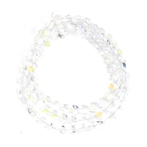 Detailed macro view of faceted yellow iridescent crystal glass beads for DIY jewelry