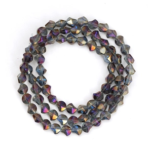 Detailed close-up of iridescent AB coated grey irregular faceted glass beads for DIY jewelry