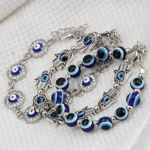 Set de pulseras del Ojo Turco y Mano de Fátima en aleación azul y plata pulida
