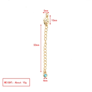 Detailed view of a 10mm lobster clasp and 50mm gold extension chain with turquoise bead