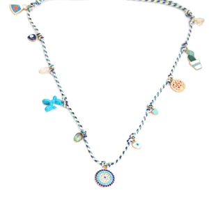 Colorful braided necklace with evil eye, blue balloon dog, and lucky cookie charms
