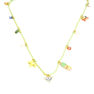 Detail of colorful woven cord necklace with gummy bear and rainbow enamel charms