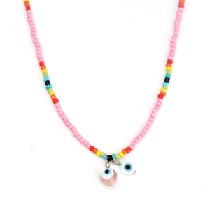 Detail of colorful beads and evil eye charms on this handmade bohemian necklace
