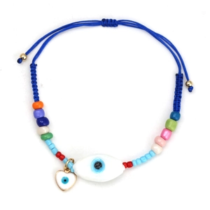 Detail of adjustable blue rope evil eye bracelet with colorful beads and heart charm