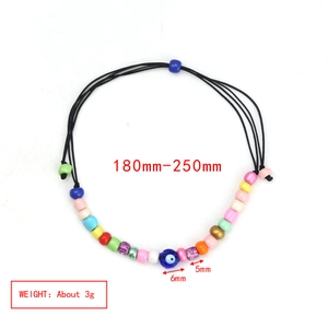 Detail view of Evil Eye beaded bracelet with 180-250mm adjustable black cord