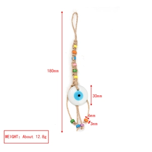 Detail showing 180mm length and 30mm diameter of this woven hemp rope Evil Eye keychain