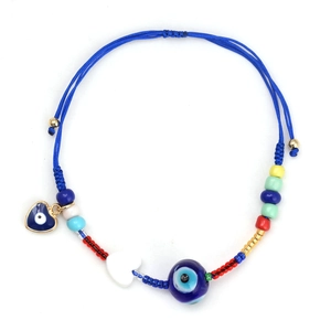 Detail view of woven blue rope bracelet with colorful beads and Turkish Evil Eye charm