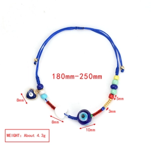Close-up of adjustable evil eye bracelet with blue cord and multicolored beads detail