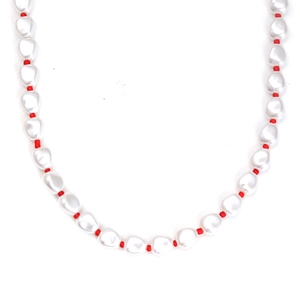 Baroque style faux pearl necklace with vibrant red beads and evil eye charm detail